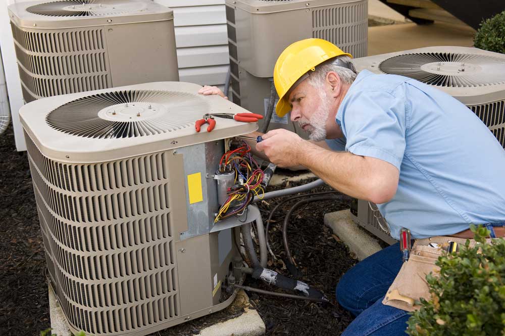man performing hvac services in longwood fl